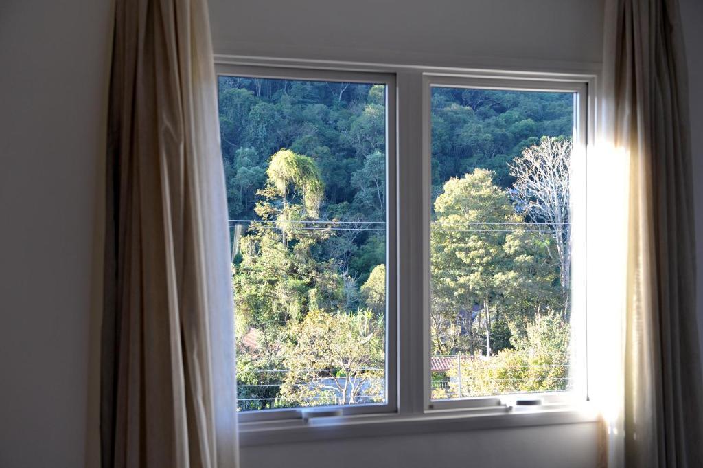 Pousada Il Villaggio Santo Antônio do Pinhal Kamer foto